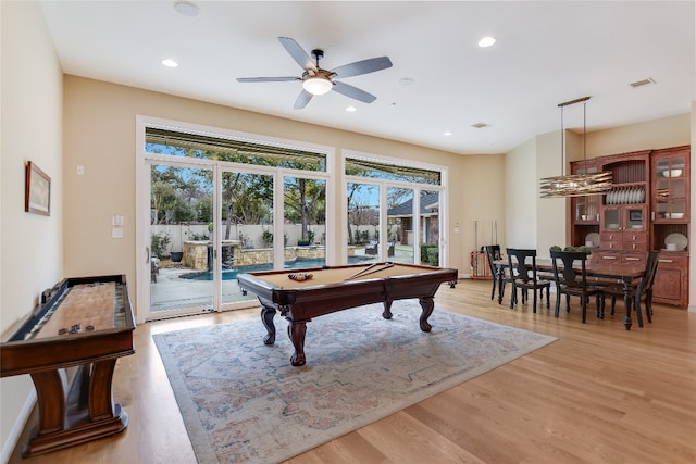 recreation room featuring a healthy amount of sunlight, light wood-style flooring, billiards, and recessed lighting