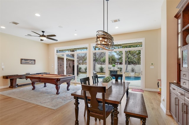 dining space featuring baseboards, light wood-style flooring, visible vents, and recessed lighting