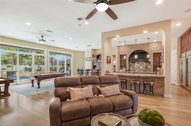 living room with light wood-style flooring, billiards, visible vents, and recessed lighting