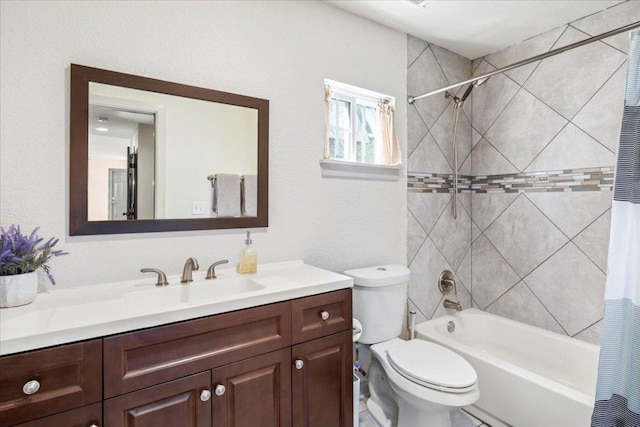 full bath with toilet, shower / bath combo with shower curtain, and vanity