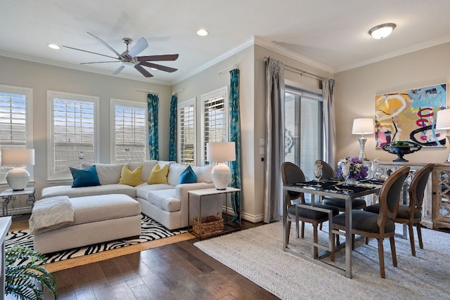 living room featuring crown molding, a ceiling fan, and hardwood / wood-style floors