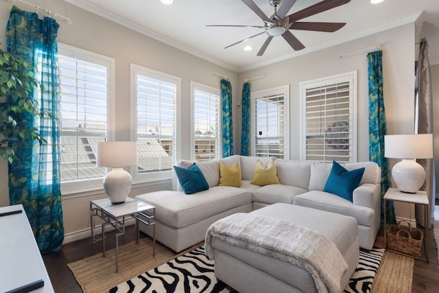 living room featuring a wealth of natural light, crown molding, recessed lighting, and wood finished floors