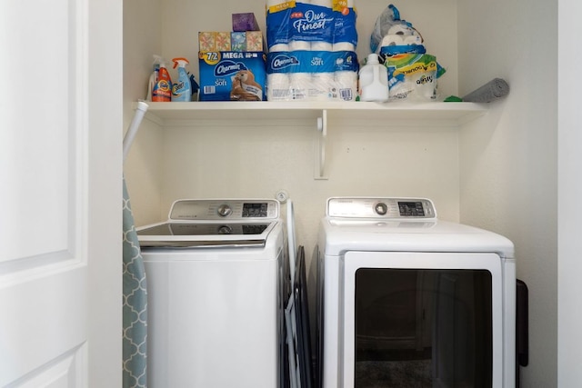 laundry room with laundry area and separate washer and dryer