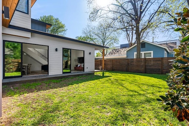 view of yard featuring fence