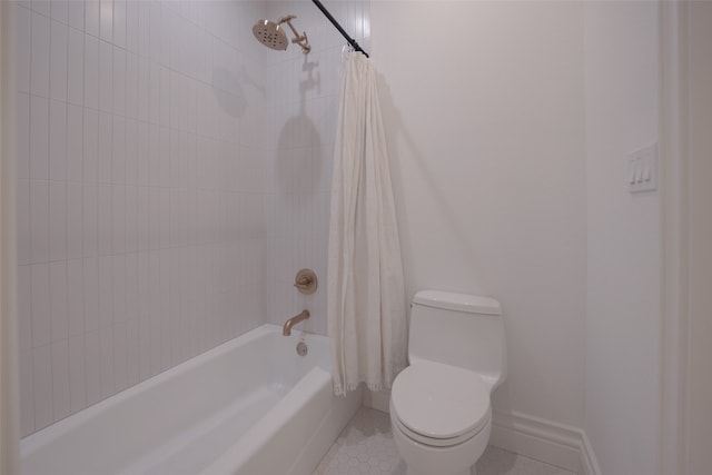 full bath featuring baseboards, tile patterned floors, toilet, and shower / bathtub combination with curtain