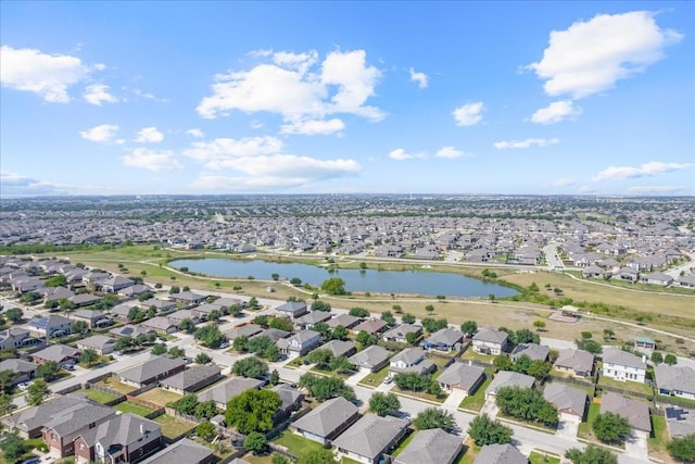 birds eye view of property with a water view and a residential view