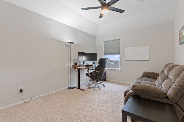 carpeted office space with vaulted ceiling, baseboards, and ceiling fan