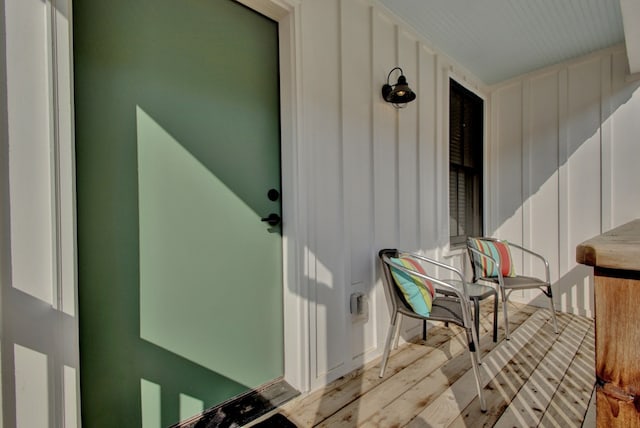 property entrance with board and batten siding