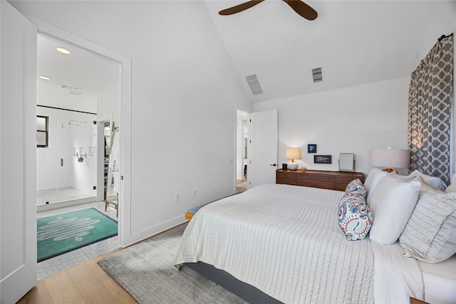 bedroom featuring baseboards, visible vents, ceiling fan, wood finished floors, and high vaulted ceiling