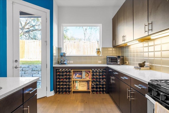 interior space featuring light wood-style floors and a toaster