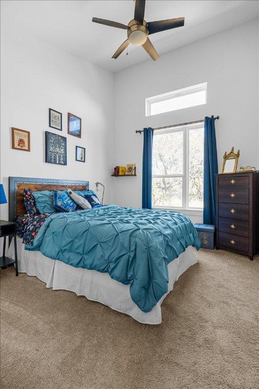 bedroom with carpet floors and ceiling fan