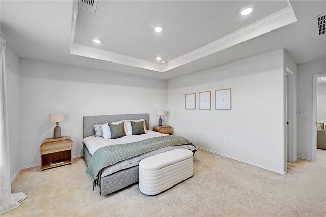 bedroom with carpet, a raised ceiling, visible vents, and recessed lighting