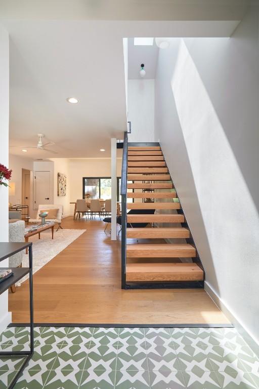 2703 Pegram Ave, Austin, TX 78757 - stairs featuring tile patterned floors and recessed lighting