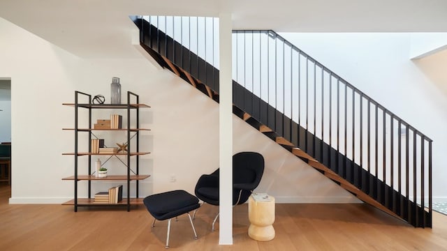 2703 Pegram Ave, Austin, TX 78757 - stairway featuring wood finished floors