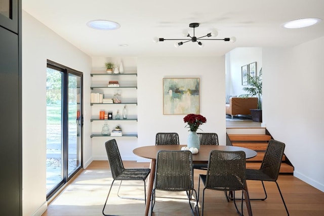 2703 Pegram Ave, Austin, TX 78757 - dining area featuring wood finished floors, recessed lighting, and baseboards