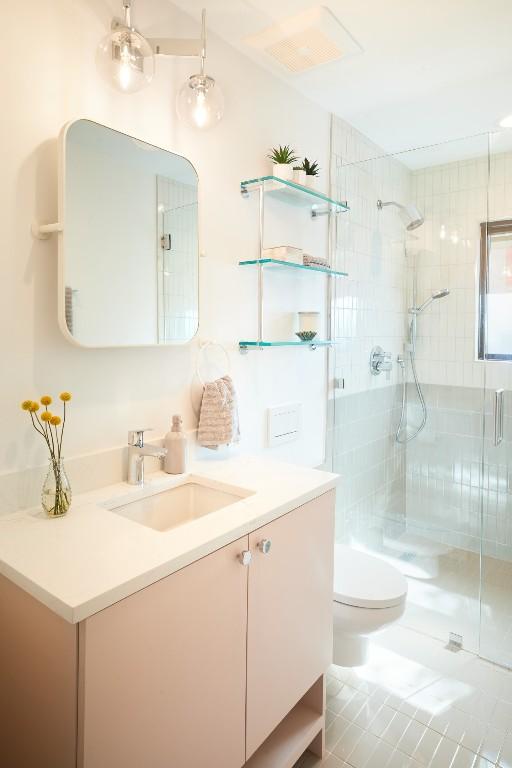 2703 Pegram Ave, Austin, TX 78757 - full bath with vanity, a shower stall, and tile patterned floors