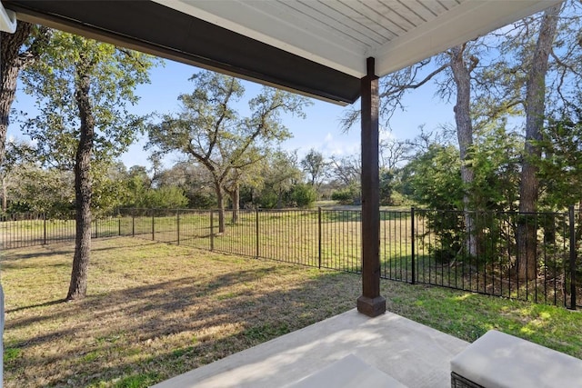 view of yard with a patio and fence