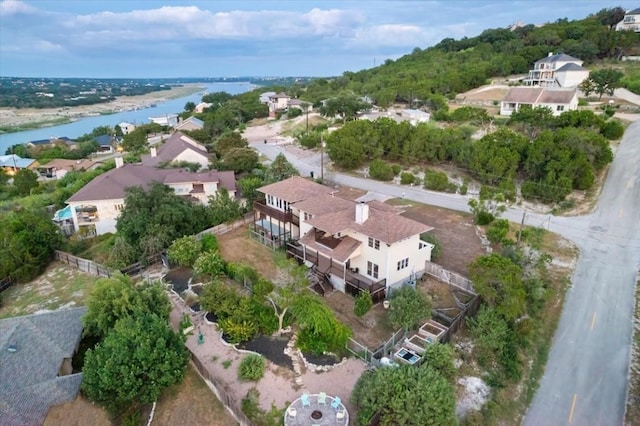 birds eye view of property with a residential view and a water view