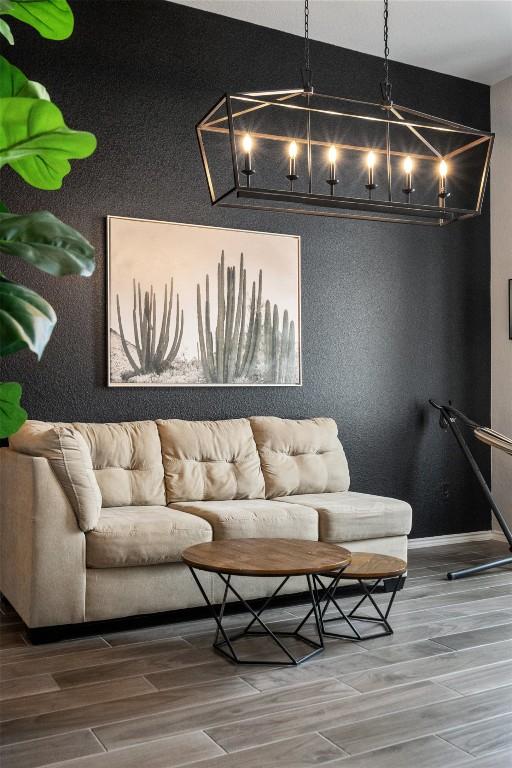 living room featuring baseboards and wood finished floors