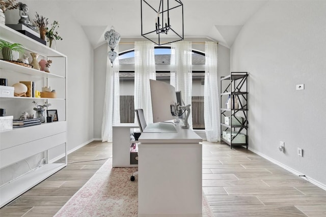 home office with wood finish floors, vaulted ceiling, and baseboards