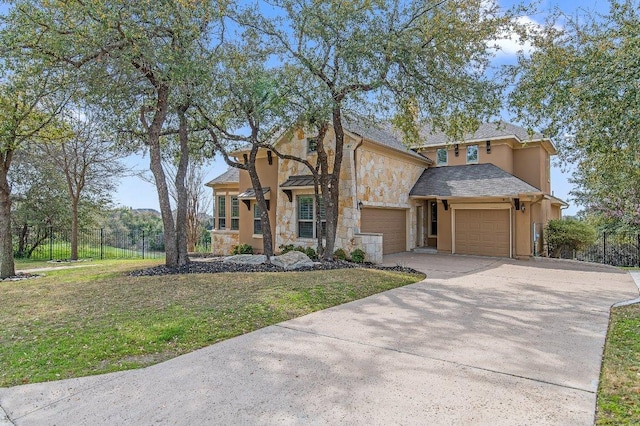 traditional-style house featuring stucco siding, concrete driveway, fence, stone siding, and a front lawn