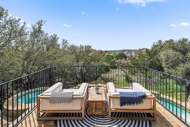 balcony featuring outdoor lounge area