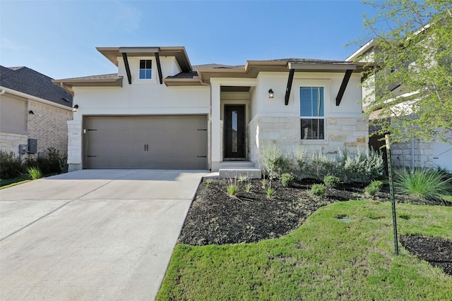 prairie-style home with stone siding, driveway, an attached garage, and stucco siding