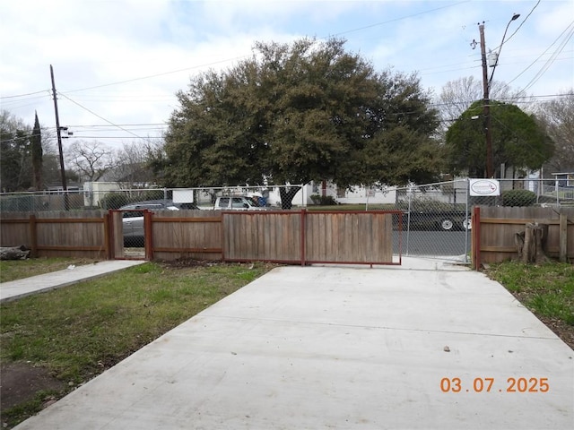 exterior space featuring a gate and fence