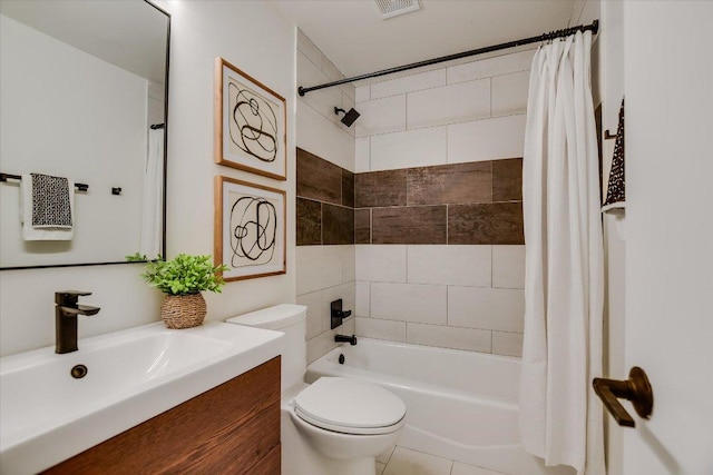 bathroom featuring vanity, shower / bath combo with shower curtain, and toilet