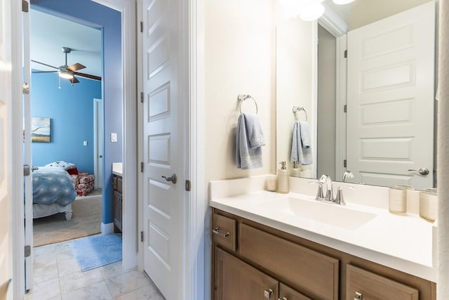 bathroom featuring ensuite bath, tile patterned flooring, ceiling fan, and vanity