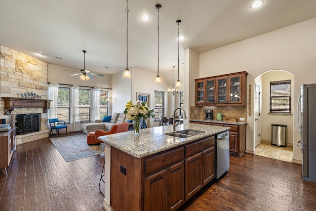 2618 Plantation Dr, Round Rock, TX 78681 - kitchen with a sink, stainless steel appliances, ceiling fan, a center island with sink, and open floor plan