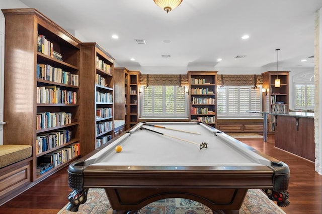 recreation room featuring visible vents, billiards, dark wood-style flooring, and a wealth of natural light