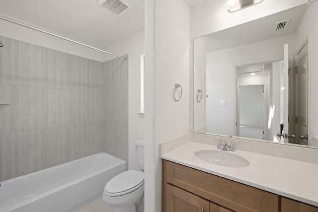 full bath with bathtub / shower combination, visible vents, vanity, and toilet