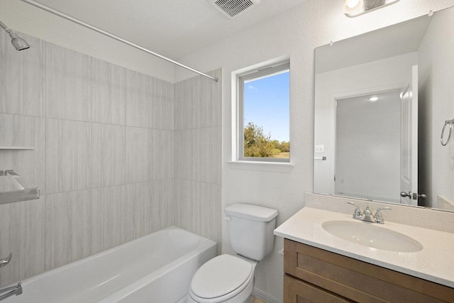 full bath with washtub / shower combination, toilet, vanity, and visible vents