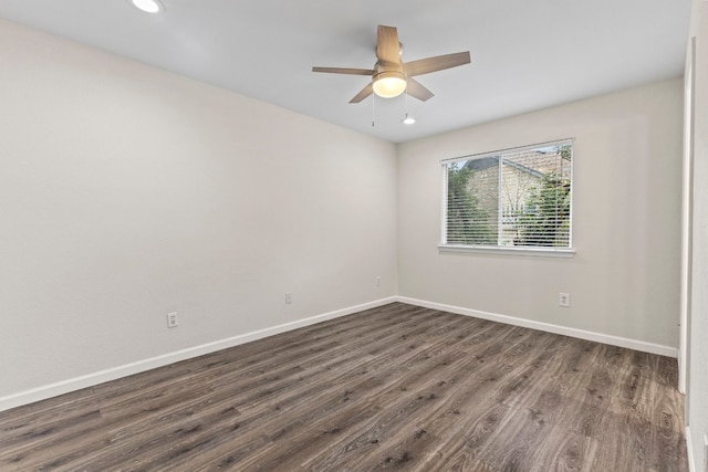 unfurnished room featuring dark wood-type flooring, recessed lighting, a ceiling fan, and baseboards