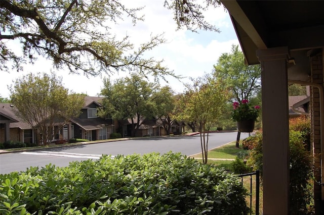 view of road featuring sidewalks and curbs