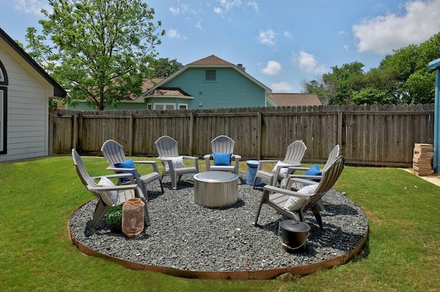 view of patio with a fire pit and a fenced backyard