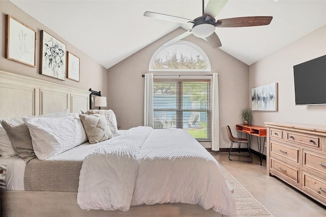 bedroom with built in study area, vaulted ceiling, baseboards, and ceiling fan