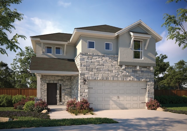 view of front of home with a garage, fence, concrete driveway, stone siding, and stucco siding