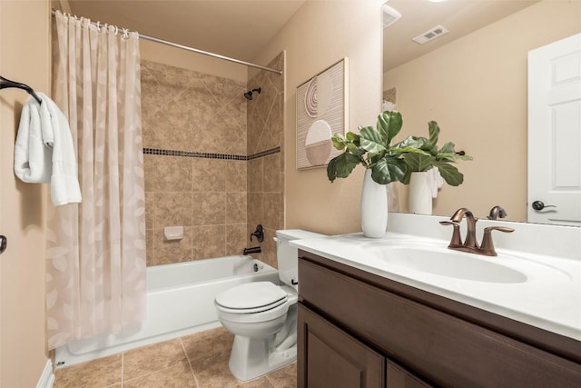 full bath featuring toilet, vanity, visible vents, tile patterned floors, and shower / bath combination with curtain