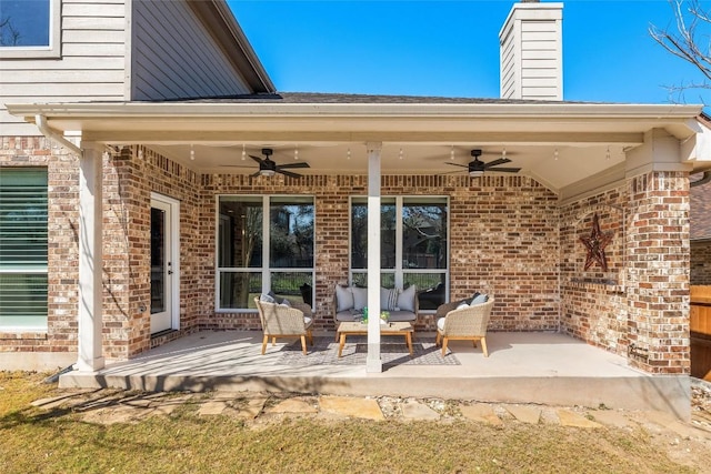 view of patio featuring outdoor lounge area and ceiling fan