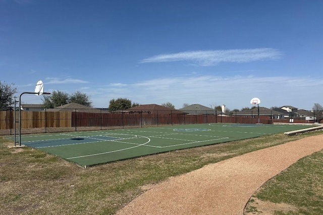 view of sport court featuring community basketball court and fence