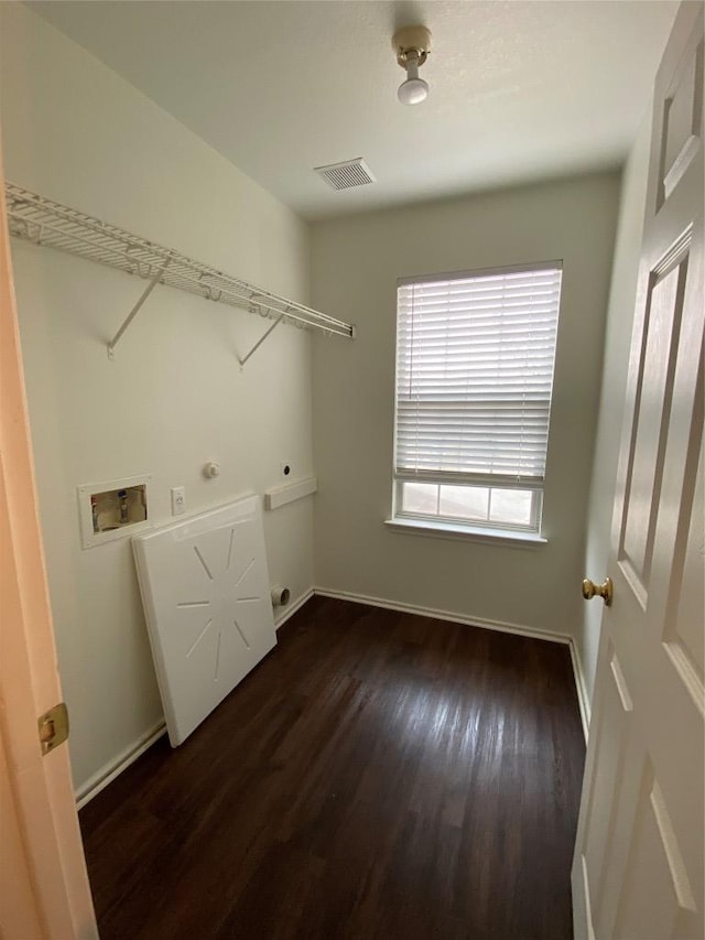 laundry area featuring washer hookup, dark wood finished floors, visible vents, electric dryer hookup, and laundry area