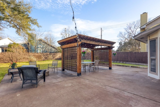 view of patio featuring fence and a pergola