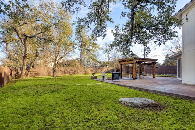 view of yard featuring a patio area, a fenced backyard, and a gazebo