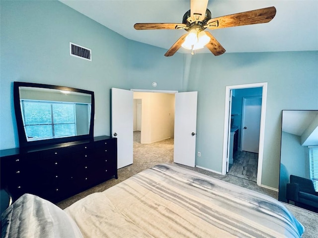 bedroom featuring vaulted ceiling, carpet floors, and a ceiling fan