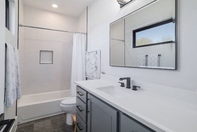 bathroom featuring toilet, shower / bathtub combination with curtain, recessed lighting, and vanity