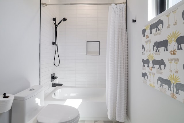 full bathroom featuring toilet and shower / bath combo with shower curtain