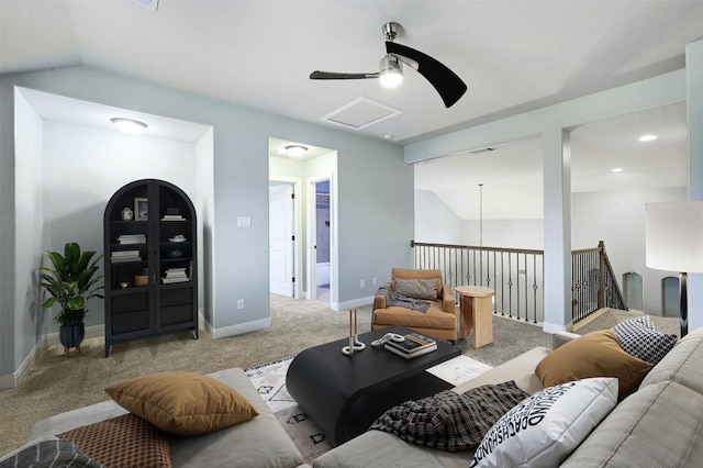 living area featuring attic access, baseboards, vaulted ceiling, carpet flooring, and recessed lighting