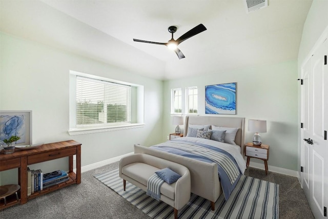 bedroom featuring a ceiling fan, baseboards, visible vents, and carpet flooring